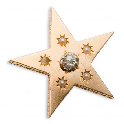 Broche etoile en or, diamant et perles